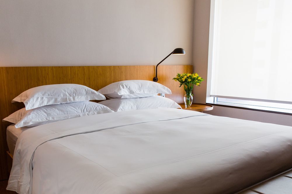 B Hotel Бразилиа Экстерьер фото A bed
